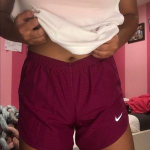 purple nike dri-fit shorts